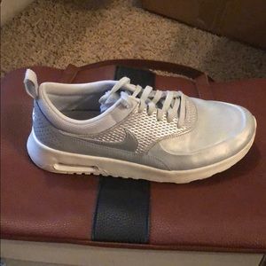 Women’s NIKE silver leather trainers 8.5